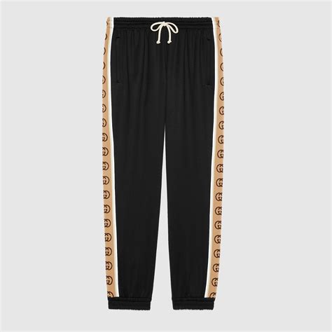 fake gucci jogging pants|gucci side stripe track pants.